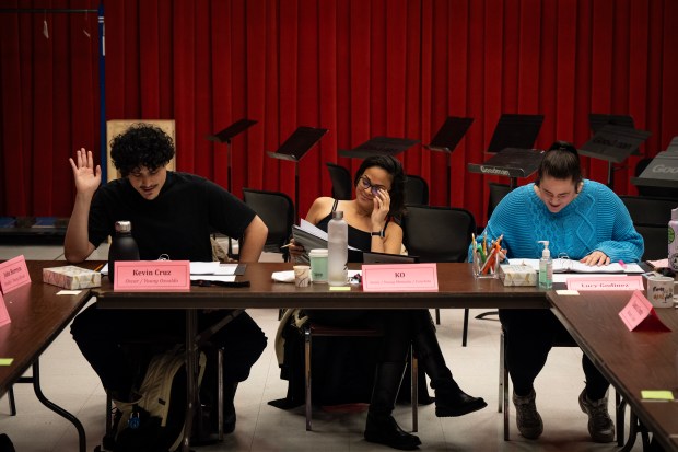 Actors Kevin Cruz, KO, and Lucy Godinez during a rehearsal of a new musical, "Broken Eggs", directed by Henry Godinez at the Goodman Theatre, Dec. 2, 2024. (E. Jason Wambsgans/Chicago Tribune)