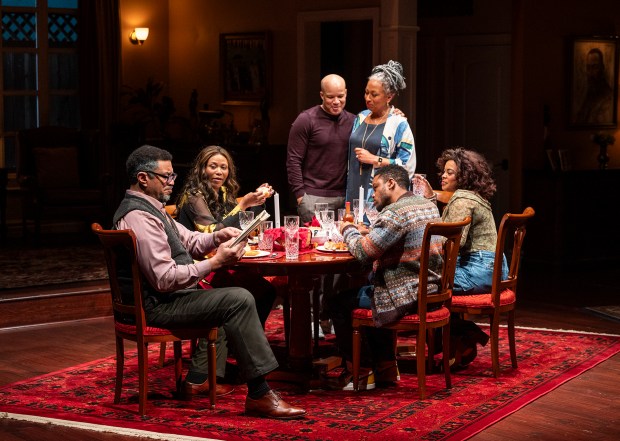 Harry Lennix, ensemble members Alana Arenas and Glenn Davis, Tamara Tunie, Ayanna Bria Bakari and ensemble member Jon Michael Hill in Steppenwolf Theatre Company's world premiere of "Purpose" byBranden Jacobs-Jenkins. (Michael Brosilow)