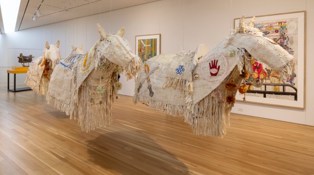 New Yorker Losel Yauch based "Procession Immemorial" on her grandfather's memories of growing up in eastern Tibet. Her horses, currently on view in "Reimagine: Himalayan Art Now" at Wrightwood 659, are sculpted from willow branches, recycled sari silk, brass bells, raffia and cotton. (Michael Topea)