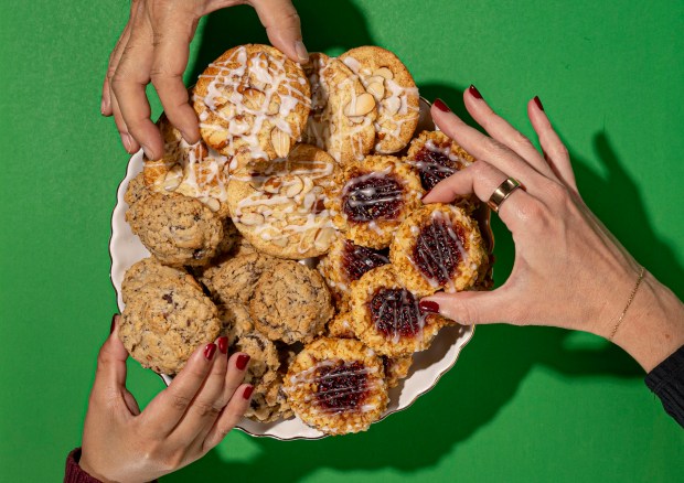 The 2024 Chicago Tribune cookie contest winner is Oh Gee! Cookies by Jeanne White, lower left; Second place is Erin's Thumbprints by Erin Claussen, right; Third place is Bear Claw Snickerdoodles by Jesse Kimball, top. (Brian Cassella and Peter Tsai/Chicago Tribune. Food styling by Shannon Kinsella)