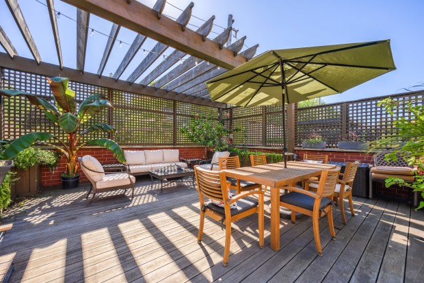 Lakeview 6-bedroom home with in-home theater, roof deck: $2.5M (Positive Image)