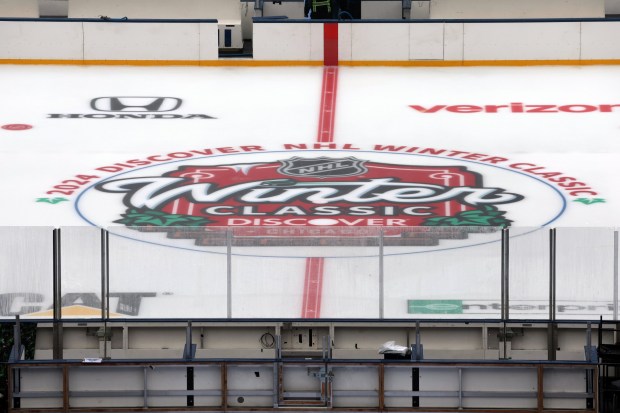 Preparations continue at Wrigley Field on Friday, Dec. 27, 2024, for the NHL Winter Classic between the Blackhawks and Blues. (Terrence Antonio James/Chicago Tribune)