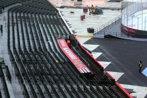 Preparations continue at Wrigley Field on Friday, Dec. 27, 2024, for the NHL Winter Classic between the Blues and Blackhawks. (Terrence Antonio James/Chicago Tribune)