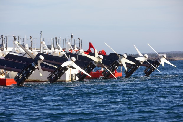 Turbines on the Bay of Fundy, between Nova Scotia and New Brunswick, Nov. 2, 2022. Engineers and scientists hope to turn the bay, which has one of the world's most powerful tides, into a clean energy source. (David Goldman/The New York Times)