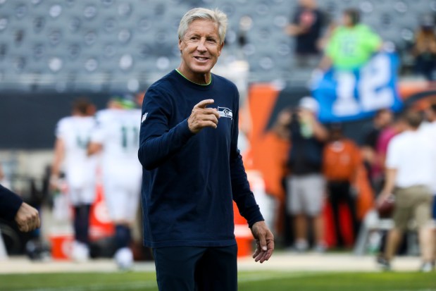 Seahawks coach Pete Carroll walks on the field before a game against the Bears on Sept. 17, 2018, at Soldier Field. (Armando L. Sanchez/Chicago Tribune)