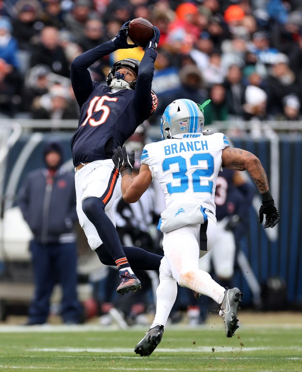 Chicago Bears wide receiver Rome Odunze (15) makes a catch in front of Detroit Lions safety Brian Branch (32) in the second quarter of a game at Soldier Field in Chicago on Dec. 22, 2024. (Chris Sweda/Chicago Tribune)