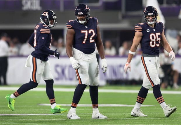 Bears offensive tackle Kiran Amegadjie stands on the field in the second quarter of a game against the Vikings at U.S. Bank Stadium in Minneapolis on Dec. 16, 2024. (Chris Sweda/Chicago Tribune)