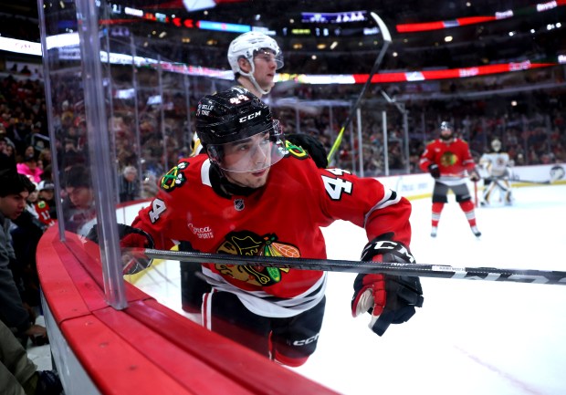 Chicago Blackhawks defenseman Wyatt Kaiser (44) looks down the ice in the third period of a game against the Boston Bruins at the United Center in Chicago on Dec. 4, 2024. (Chris Sweda/Chicago Tribune)