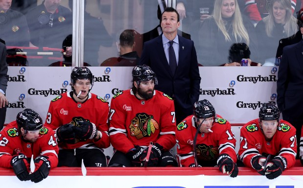 Blackhawks coach Luke Richardson looks on from the bench during a game against the Bruins on Dec. 4, 2024, at the United Center. The Hawks on Thursday fired Richardson after two-plus seasons on the job. (Chris Sweda/Chicago Tribune)