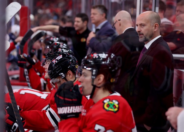 Blackhawks interim head Anders Sorensen looks on from the bench in the second period against the Jets on Dec. 7, 2024, at the United Center. (Chris Sweda/Chicago Tribune)