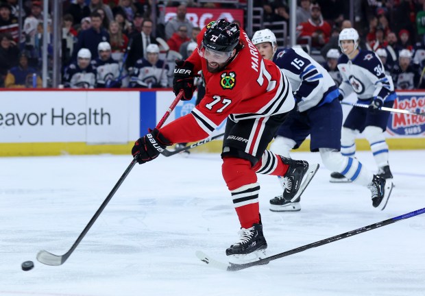 Chicago Blackhawks left wing Patrick Maroon (77) takes a shot in the third period of a game against the Winnipeg Jets at the United Center in Chicago on Dec. 7, 2024. (Chris Sweda/Chicago Tribune)