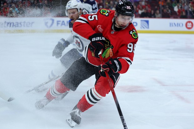 Chicago Blackhawks right wing Ilya Mikheyev (95) makes a move in the third period of a game against the Winnipeg Jets at the United Center in Chicago on Dec. 7, 2024. (Chris Sweda/Chicago Tribune)