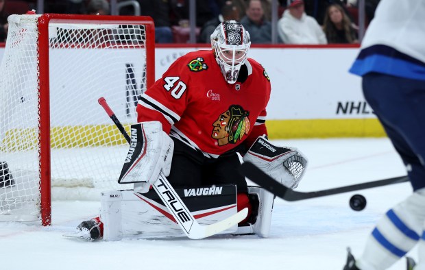 Chicago Blackhawks goaltender Arvid Soderblom (40) keeps his eyes on the puck in the second period of a game against the Winnipeg Jets at the United Center in Chicago on Dec. 7, 2024. (Chris Sweda/Chicago Tribune)