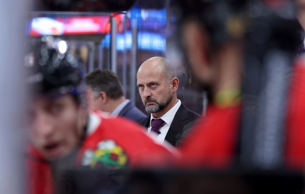 Chicago Blackhawks interim head coach Anders Sorensen looks on from the bench in the second period of a game against the Winnipeg Jets at the United Center in Chicago on Dec. 7, 2024. (Chris Sweda/Chicago Tribune)