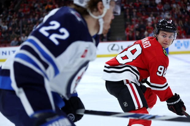 Chicago Blackhawks center Connor Bedard (98) skates down the ice in the second period of a game against the Winnipeg Jets at the United Center in Chicago on Dec. 7, 2024. (Chris Sweda/Chicago Tribune)