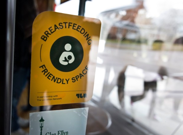 Breastfeeding Friendly Space sticker is posted at the entrance of Blackberry Market in Glen Ellyn, Dec 27, 2024. (James C. Svehla/for the Chicago Tribune)