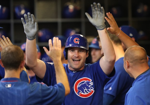 Chicago Cubs third baseman Tommy La Stella (2) is congratulated after hitting a home run in the fourth inning against the Milwaukee Brewers at Miller Park Wednesday, Sept. 5, 2018, in Milwaukee.(John J. Kim/Chicago Tribune)