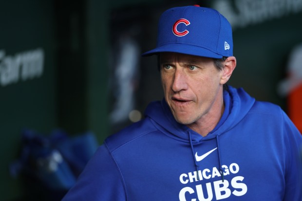 Cubs manager Craig Counsell stands in the dugout before the start of a game against the Phillies at Wrigley Field on July 2, 2024. (Chris Sweda/Chicago Tribune)