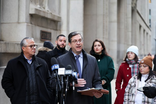 Ald. Scott Waguespack, 32nd, speaks during a news conference calling for transparency around the city's do-not-hire list policy outside City Hall on Dec. 3, 2024. (Eileen T. Meslar/Chicago Tribune)