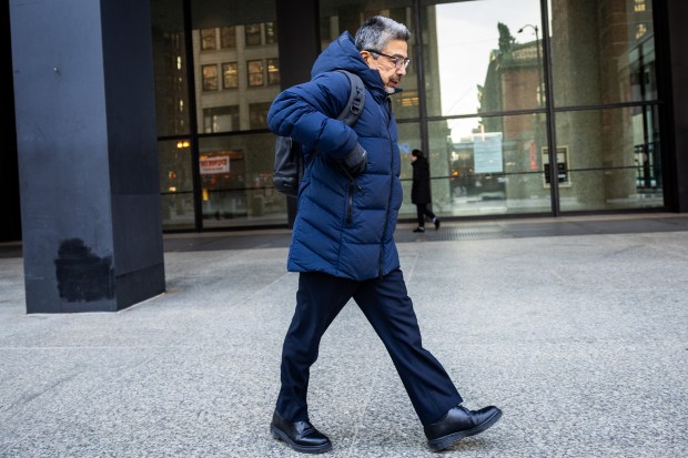 Former Ald. Daniel Solis leaves Dirksen U.S. Courthouse after another day of testimony in the corruption trial of former Speaker Michael Madigan in Chicago on Dec. 3, 2024. (Tess Crowley/Chicago Tribune)