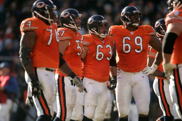 Ruben Brown (74), Olin Kreutz (57), Roberto Garza (63) and Fred Miller (69) - Chicago Bears defeat the San Francisco 49ers 41-10 at Soldier Field in Chicago on Sunday, Oct. 29, 2006. (Chicago Tribune Photo by Scott Strazzante) ..OUTSIDE TRIBUNE CO.- NO MAGS, NO SALES, NO INTERNET, NO TV.. 00267225B Bears1029 (football pro)