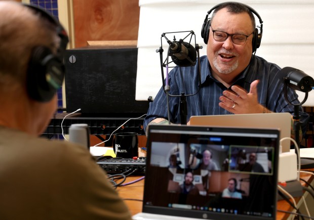 Co-hosts of Sound Opinions, Greg Kot and Jim DeRogatis, record an episode at DeRogatis' home studio on Nov. 22, 2024. (Antonio Perez/Chicago Tribune)