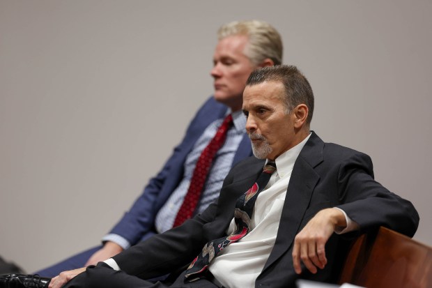 Defendants and former Cook County assistant state's attorneys, Nicholas Trutenko, right, and Andrew Horvat sit on a bench behind their attorneys during closing statements in their trial at the courthouse in Rolling Meadows on Dec. 4, 2024. (Stacey Wescott/Chicago Tribune)