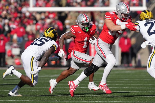 Quinshon Judkins #1 of the Ohio State Buckeyes carries the ball against the Michigan Wolverines during the second quarter at Ohio Stadium on Nov. 30, 2024 in Columbus, Ohio. (Photo by Jason Mowry/Getty Images)