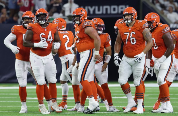 Bears offensive linemen head to the line of scrimmage against the Texans on Sept. 15, 2024, in Houston. (John J. Kim/Chicago Tribune)