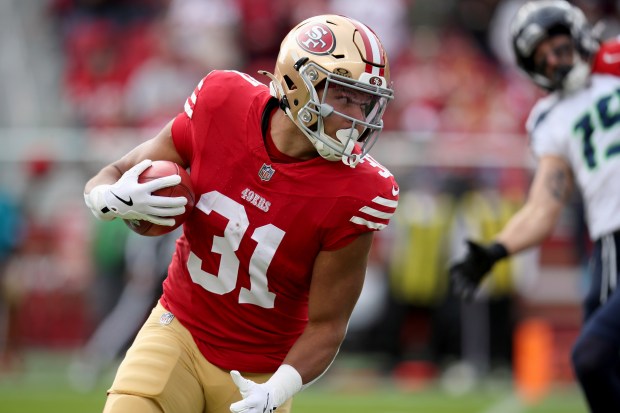 The 49ers' Isaac Guerendo runs against the Seahawks on Nov. 17, 2024, in Santa Clara, Calif. (Scot Tucker/AP)