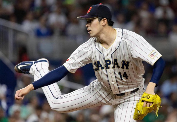 Japan pitcher Roki Sasaki delivers against Mexico during a semifinal at the World Baseball Classic on March 20, 2023, at loanDepot Park in Miami. (Matias J. Ocner/Miami Herald)