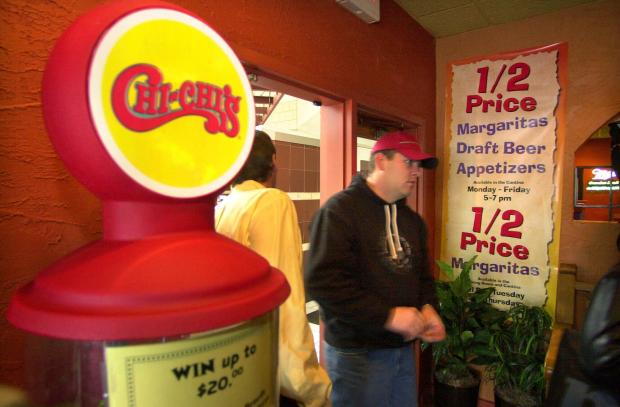 An unidentified man arrives at the Chi-Chi's Mexican Restaurant in the Beaver Valley Mall on Jan. 15, 2004, in Monaca, Pa. (AP Photo/Gene J. Puskar, File)