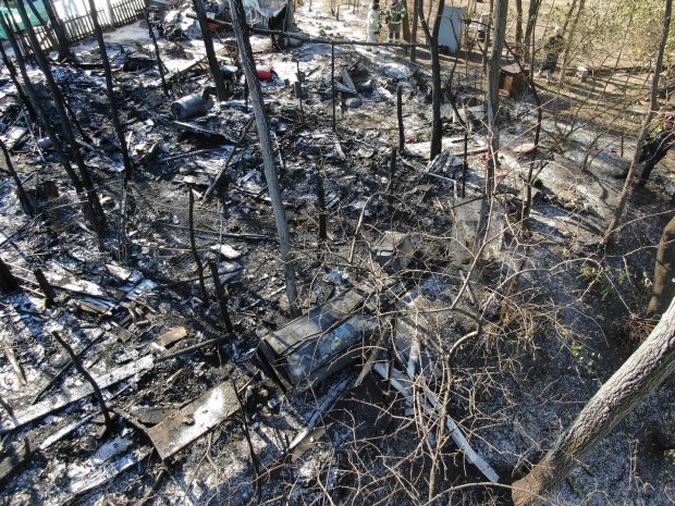 This overhead drone shot shows the portion of Elgin's tent city destroyed in one of two fires that broke out in the encampment along the Metra tracks off Route 31. The fires, both earlier this month, have prompted the city to begin efforts to relocate the residents who live there and to raze their makeshift houses. (City of Elgin)