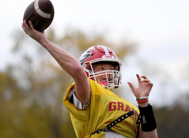 Grant's quarterback Matthew Gipson tosses a pass into the end zone. Grant's football team practices for their upcoming first round playoff game against Burlington Central, Wednesday, Oct. 30, 2024. (Rob Dicker / for the News-Sun)