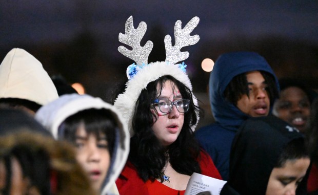 The combined choir of District 6 and District 126 singers at the Christmas Tree Lighting event at the Zion Park District Leisure Center in Zion on Dec. 13, 2024. (Karie Angell Luc/Lake County News-Sun)