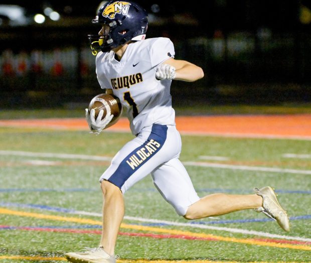 Neuqua Valley's Sean Anshel runs the ball against Naperville North in Naperville on Friday, Oct. 11, 2024. (Mark Black / for the Naperville Sun)