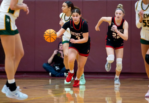 Benet's Aria Mazza (3) dribbles down the court during the championship game of the Montini Christmas Tournament at Montini Catholic High School in Lombard on Saturday, Dec. 28, 2024. (Nate Swanson / for the Naperville Sun)