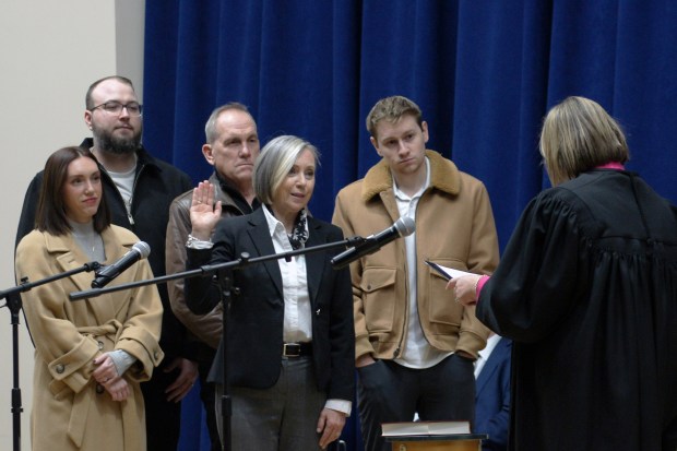 Liz Chaplin is sworn in as DuPage County Recorder at an inauguration ceremony in Wheaton on Monday, Dec. 2, 2024. (Evan Shields)