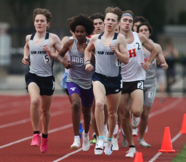 New Trier's Ben Crane leads the second heat of the 3200-meter race during the Class 3A Loyola Sectional at Loyola Academy in Wilmette on Thursday, May 16, 2024. (Trent Sprague/for the Pioneer Press)