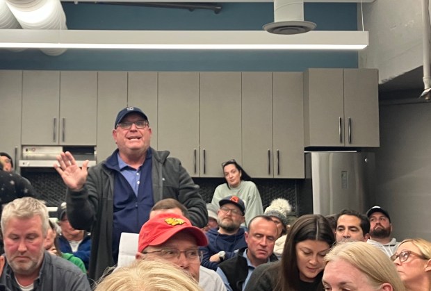 Greg White, president of River Forest Youth Baseball-Softball, speaks at a Dec. 9 meeting of the River Forest Park Board, voicing reservations about a proposed deal allowing the Dominican University softball team to use a field at Keystone Park for practices and home games. (Bob Skolnik/Pioneer Press)