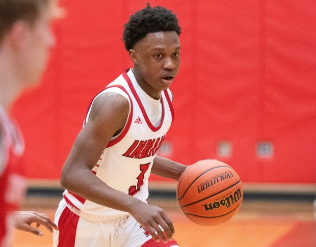 Portage's O'Mari Evans (3) moves the ball against Crown Point during a game in the first round of the Class 4A Crown Point Sectional on Tuesday, Feb. 28, 2023. (Michael Gard / Post-Tribune)