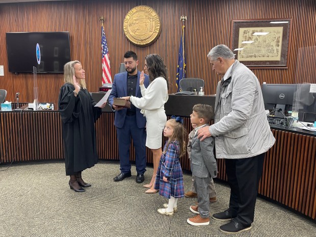 Lake County Recorder Gina Pimentel was sworn in on Dec. 27, 2024, by Lake County Circuit Court Judge Marrisa McDermott. Her husband, Phil; 4-year-old daughter Gianna; 4-year-old son Dominic; 6-year-old son Philly and her father Frank Lazzaro attended the ceremony with her. (Alexandra Kukulka/Post-Tribune)