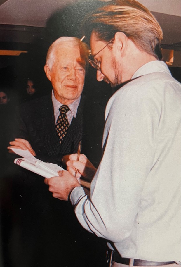 Columnist Philip Potempa interviewed President Jimmy Carter on Oct. 28, 1998, during a book signing event at Borders bookstore on State Street in downtown Chicago. (Irene Jakubowski/photo)