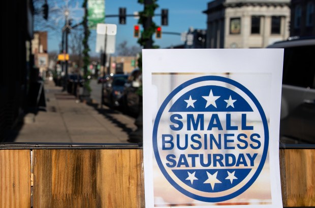 Businesses along Main Street in downtown Hobart advertise Small Business Saturday on Nov. 30, 2024. (Michael Gard/for the Post-Tribune)