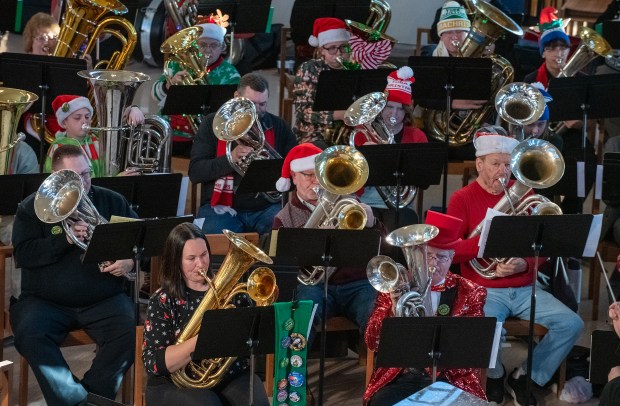 More than 80 musicians took part in the annual TubaChristmas held in the Chapel of the Resurrection at Valparaiso University in Valparaiso, Indiana on Sunday, Dec. 8, 2024. (Andy Lavalley/for the Post-Tribune)