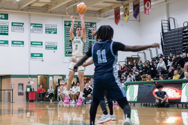 Oak Lawn's Jack Dempsey (3) shoots the ball against Hillcrest during a SSC game in Oak Lawn on Tuesday, Dec. 10, 2024. (Troy Stolt / for the Daily Southtown)