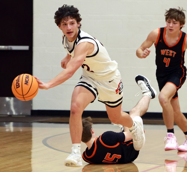 Lincoln-Way Central's Alex Panos drives down court during the basketball game against Lincoln-Way West in New Lenox on Friday, Dec. 20, 2024. (James C. Svehla / for the Daily Southtown)