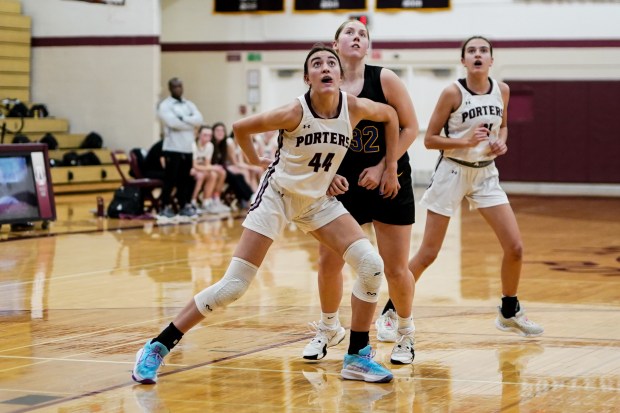 Lockport's Alaina Peetz (44) boxes out Sandburg's Abby Janociak (32) during a basketball game at Lockport High School on Monday, Dec. 16, 2024. (Sean King / for The Daily Southtown)