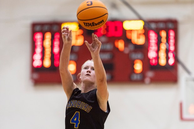 Sandburg's Ellen Driscoll (4) shoots a free throw against Sandburg during a Southwest Suburban Conference game in New Lenox on Thursday, Dec. 5, 2024. (Vincent D. Johnson / for the Daily Southtown)