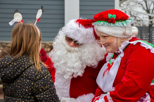 Attendees at this weekend's free Christkindl Weekend in downtown Frankfort may greet and take photos with Santa and Mrs. Claus as they stroll through the celebration both days. (Village of Frankfort)